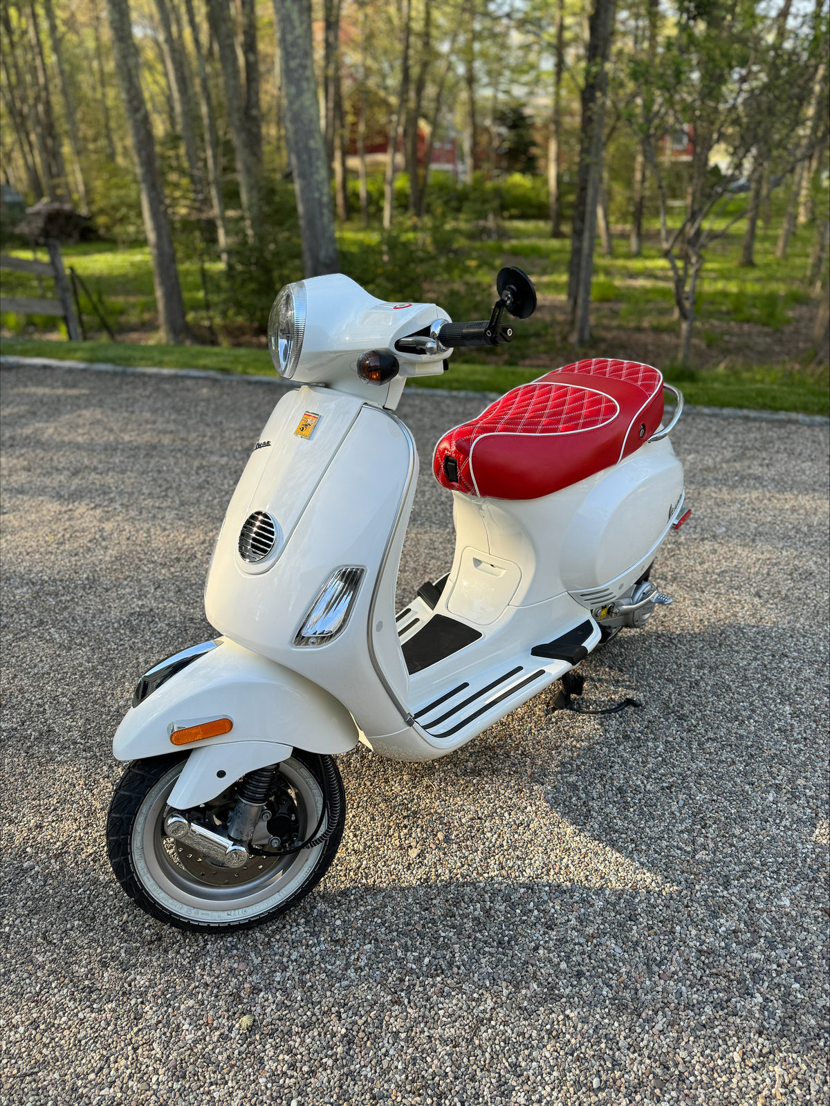 Vespa LX red diamond seat cover rear angle