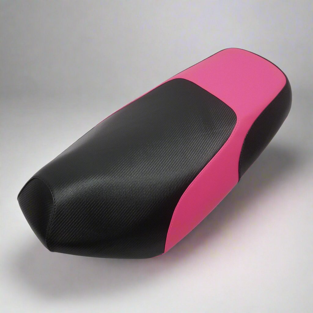 Pink and Black Yamaha Zuma 50 seat cover with a textured black center and bright pink side and rear panels, handmade by Cheeky Seats.