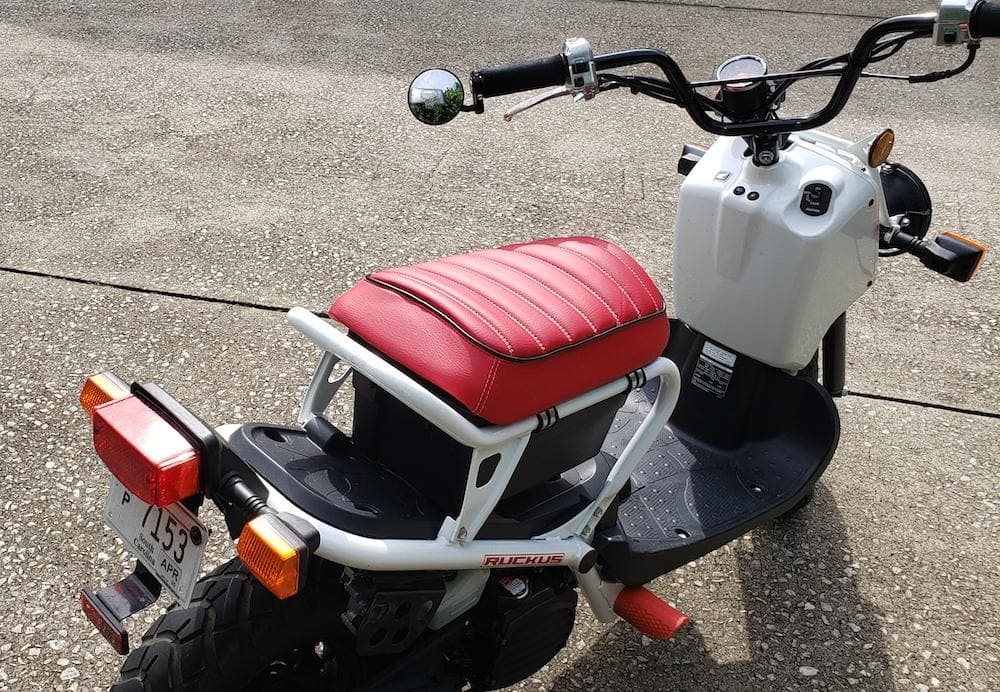 Honda Ruckus red padded tuck and roll seat cover