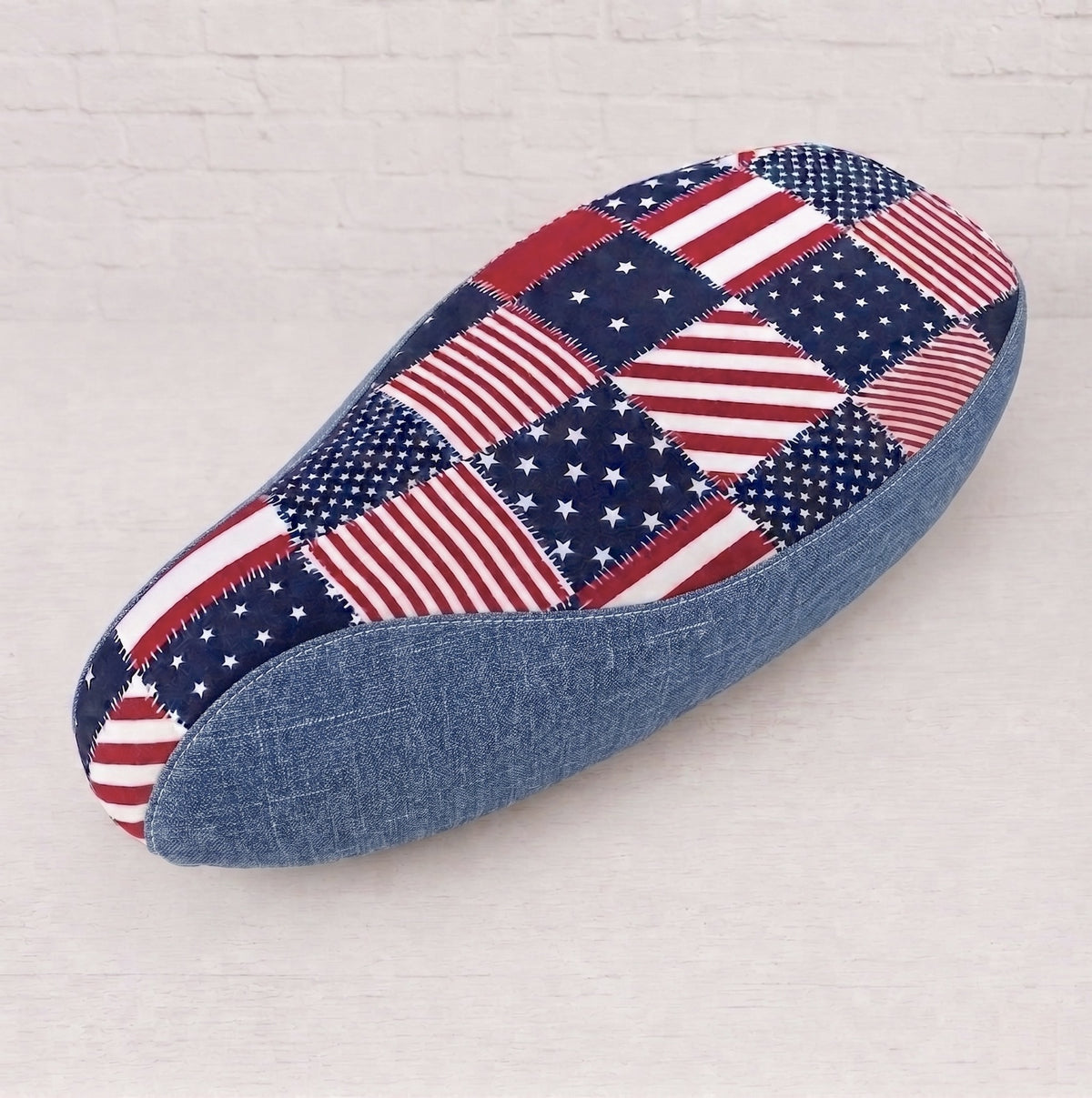 Stars and Stripes scooter seat cover with an American flag patchwork top and denim-look side panels, handmade by Cheeky Seats.