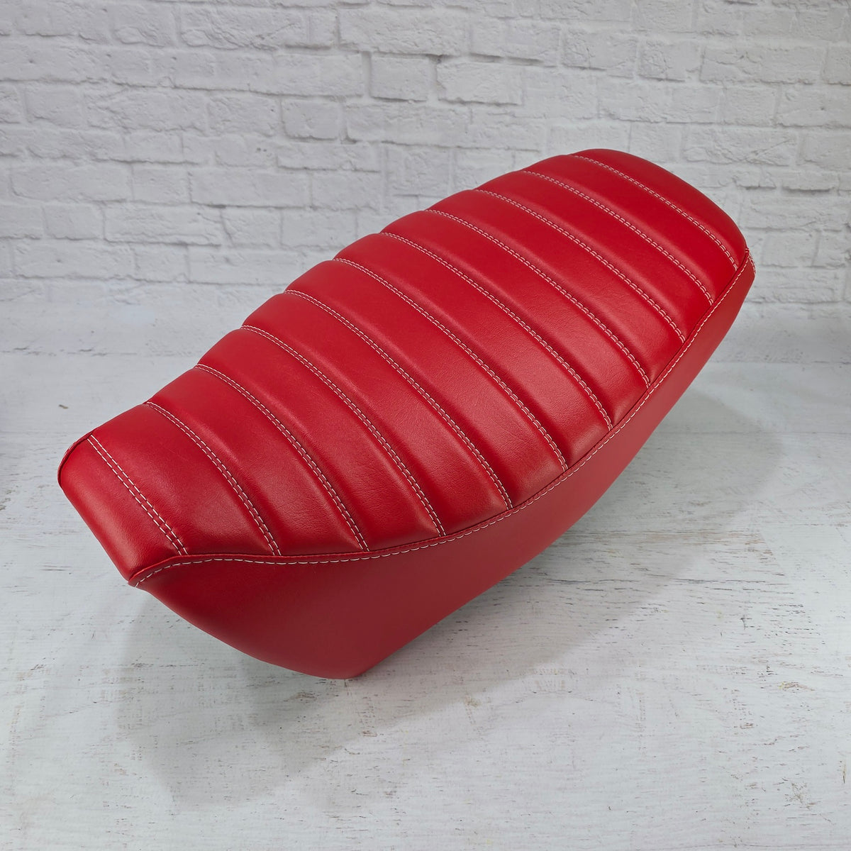 Honda Grom Red Tuck and Roll Seat Cover 2013 - 2026, handmade Honda Grom seat cover by Cheeky Seats, featured product view