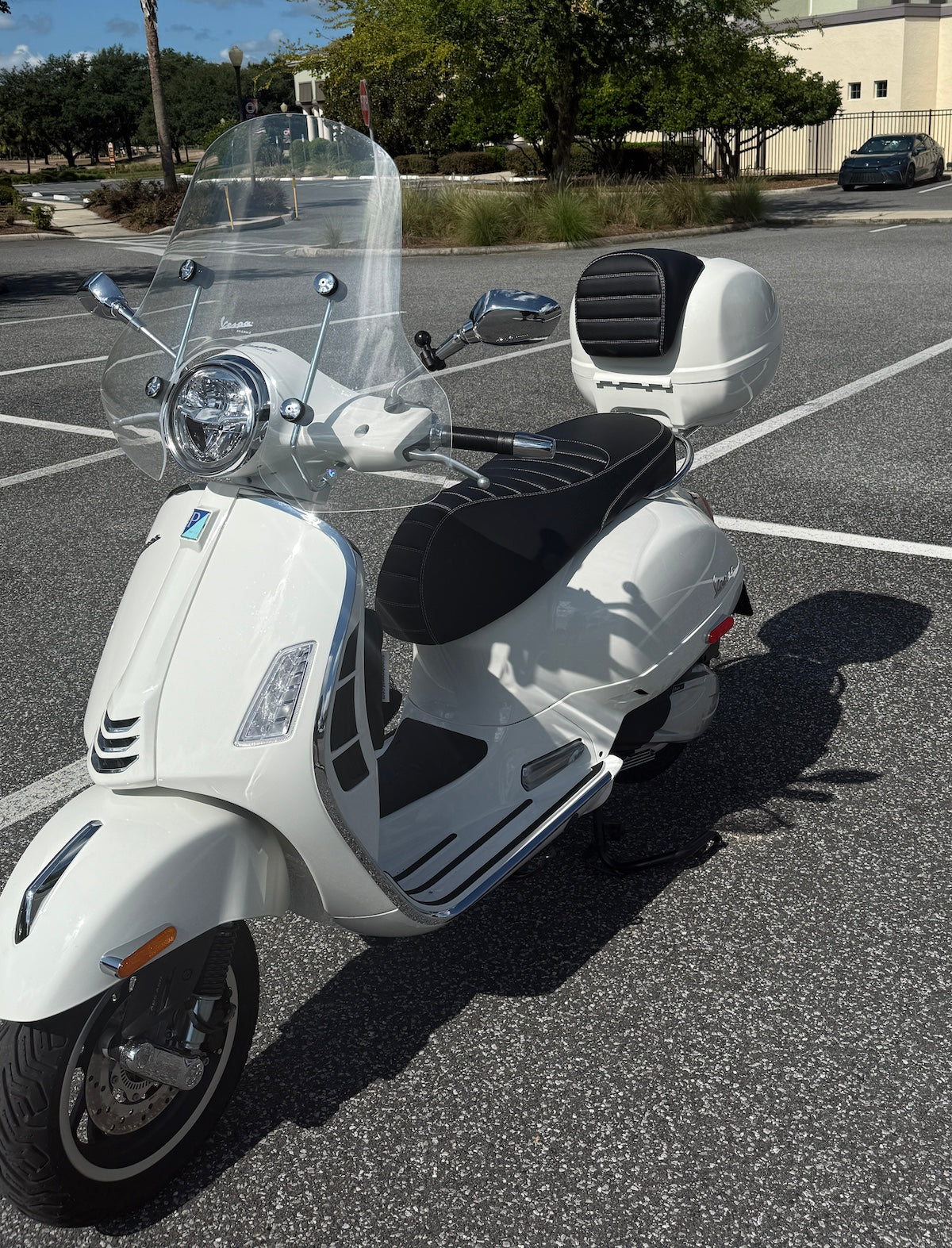 Vespa GTS black tuck and roll seat cover detail