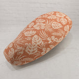 Terracoral Hibiscus scooter seat cover with a sun-washed tropical floral pattern for Vespa, Kymco, Lance and more, handmade by Cheeky Seats.