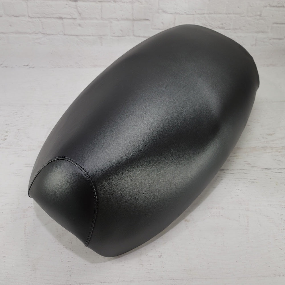 Ready-to-ship black seat cover tailored for the Yamaha Vino 125, shown from the front in a smooth factory-style finish, handmade by Cheeky Seats.