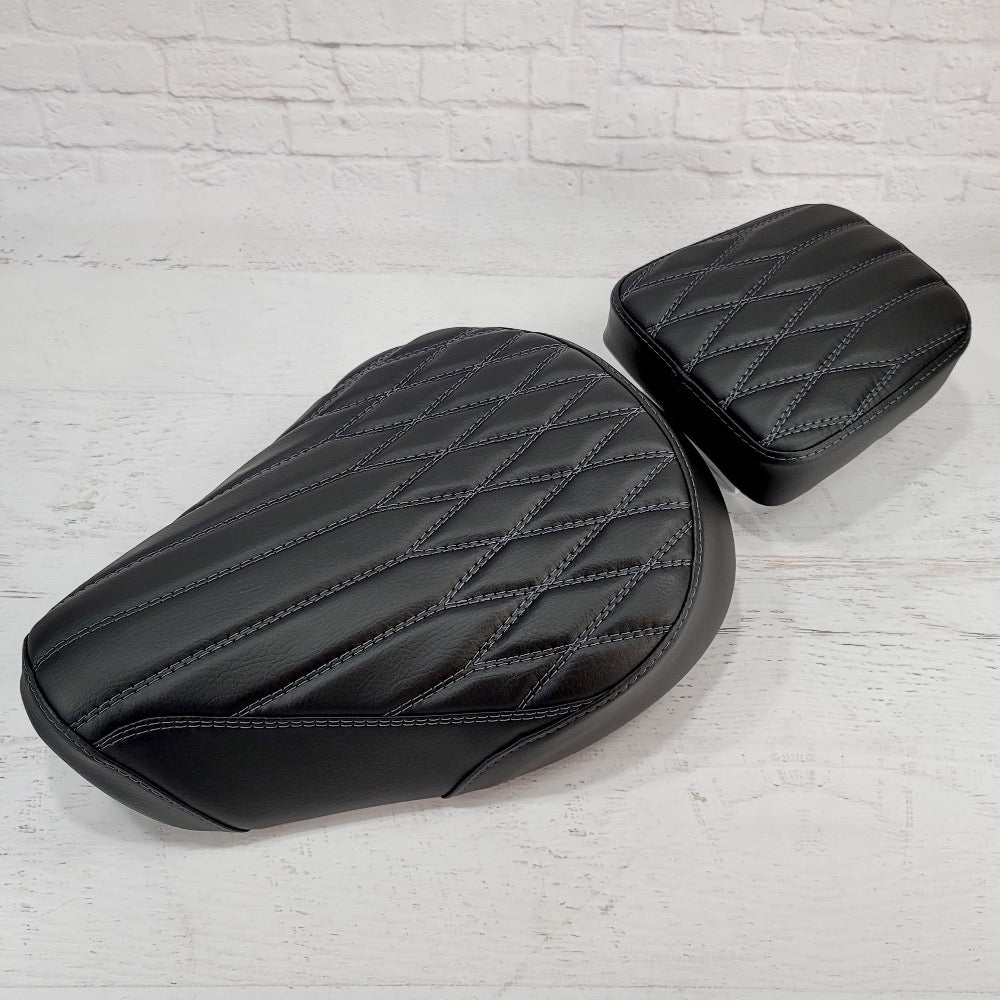 Honda Super Cub black diamond pleat seat cover close-up