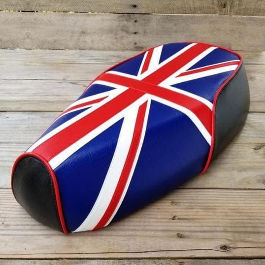 Left-front view of a Union Jack Genuine Buddy Kick 125 seat cover with hand-cut red, white and blue panels, handmade by Cheeky Seats