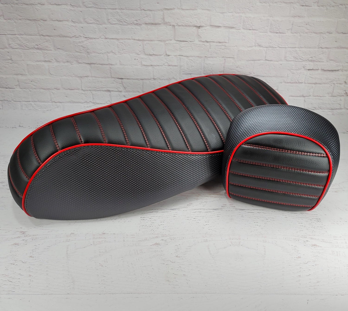 Vespa GTS charcoal tuck and roll seat cover, side view